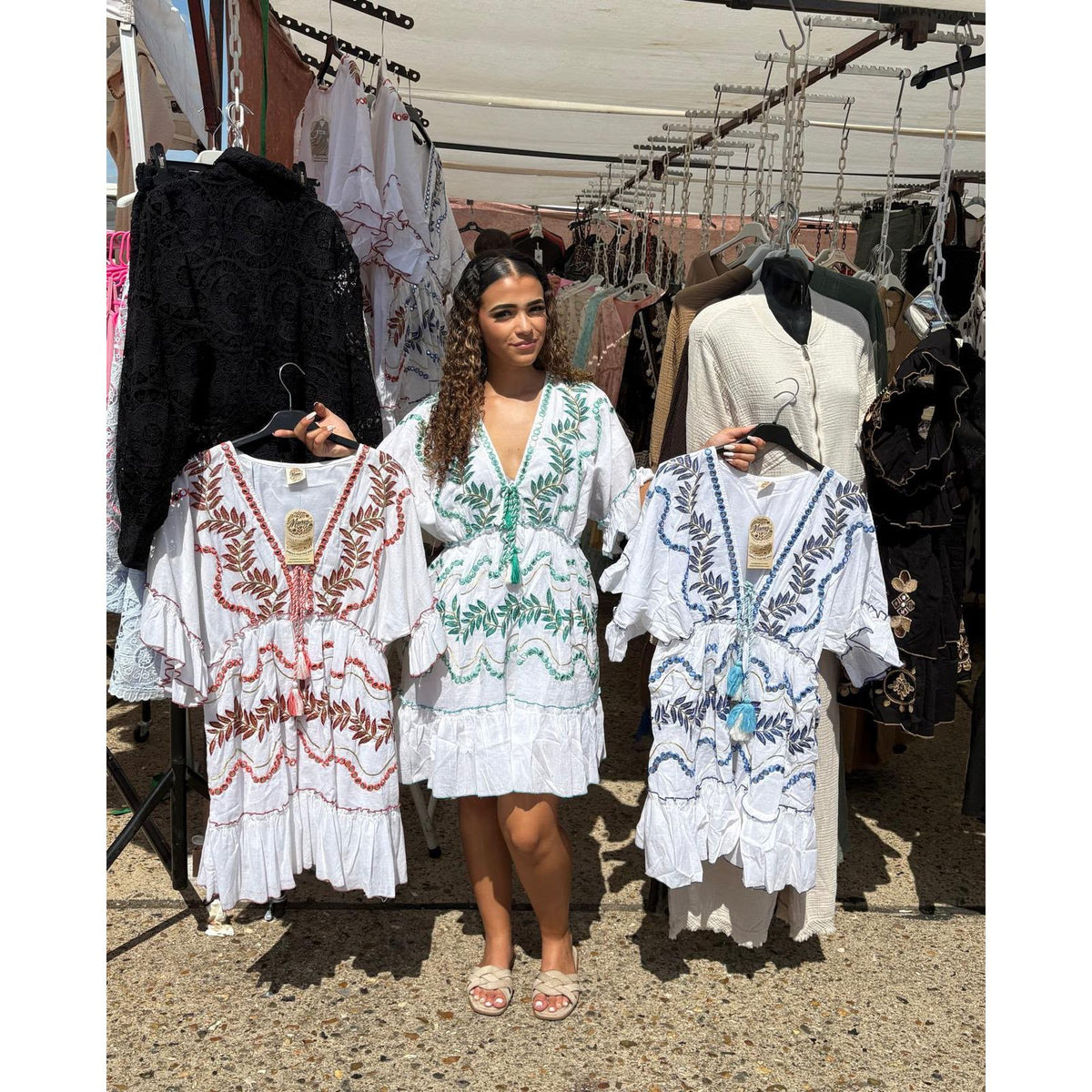White embroidered tassel mini dress with coloured embroidery, available in Terracotta, Green and Blue from Miss Foxy Boutique.