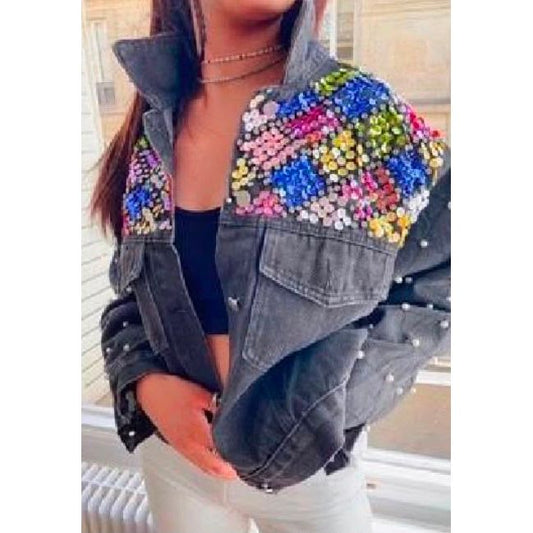 Denim jacket featuring multi-coloured crystal floral embellishments across the shoulders and pearl detailing on the sleeves. Was £35, now