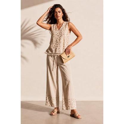 Model wearing the embroidered tassel wide leg trouser set in beige with matching wide leg trousers. Available in beige, mint and baby blue
