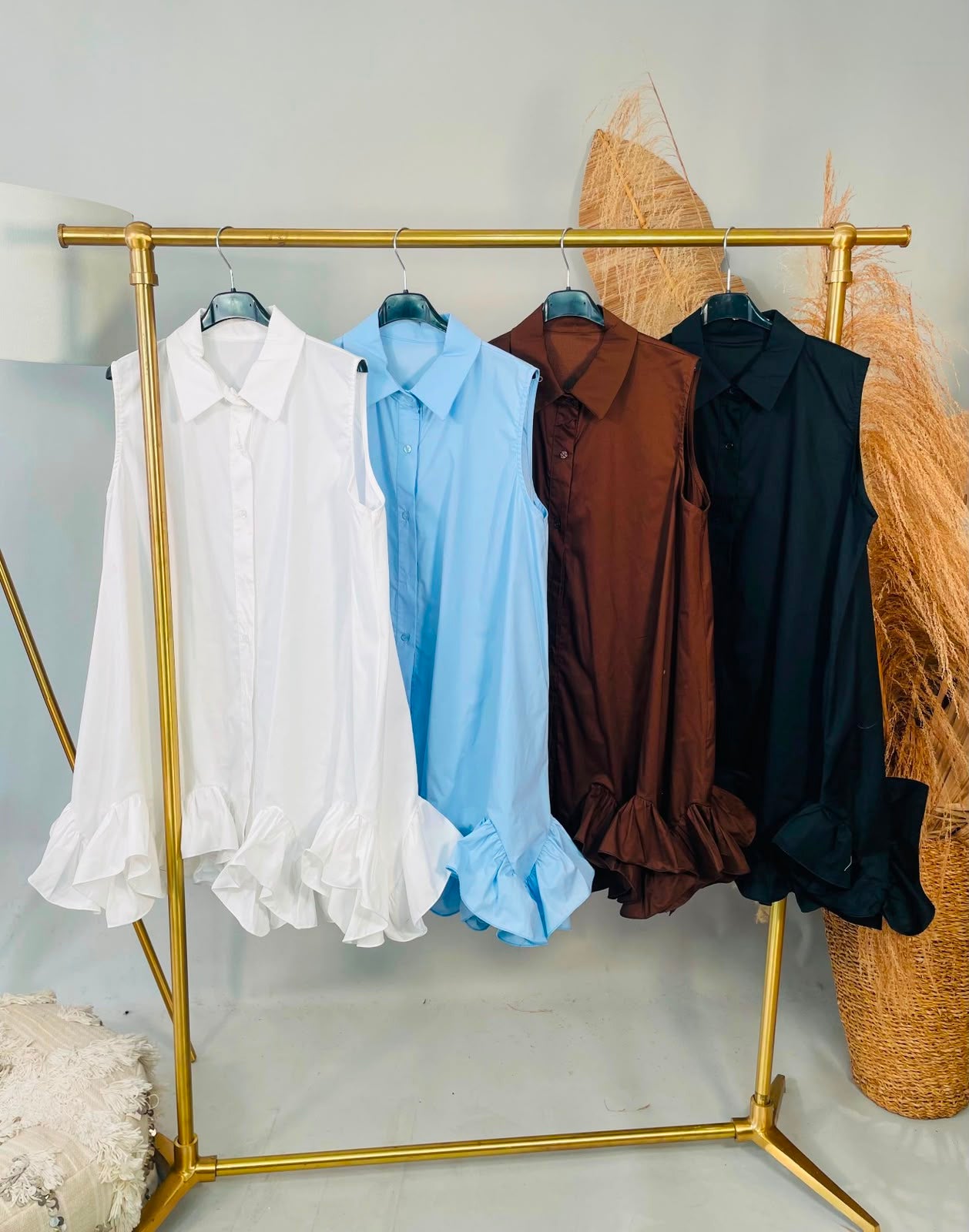 Plain sleeveless frill hem shirt dress available in Baby Blue, White, Chocolate Brown and Black from Miss Foxy Boutique.
