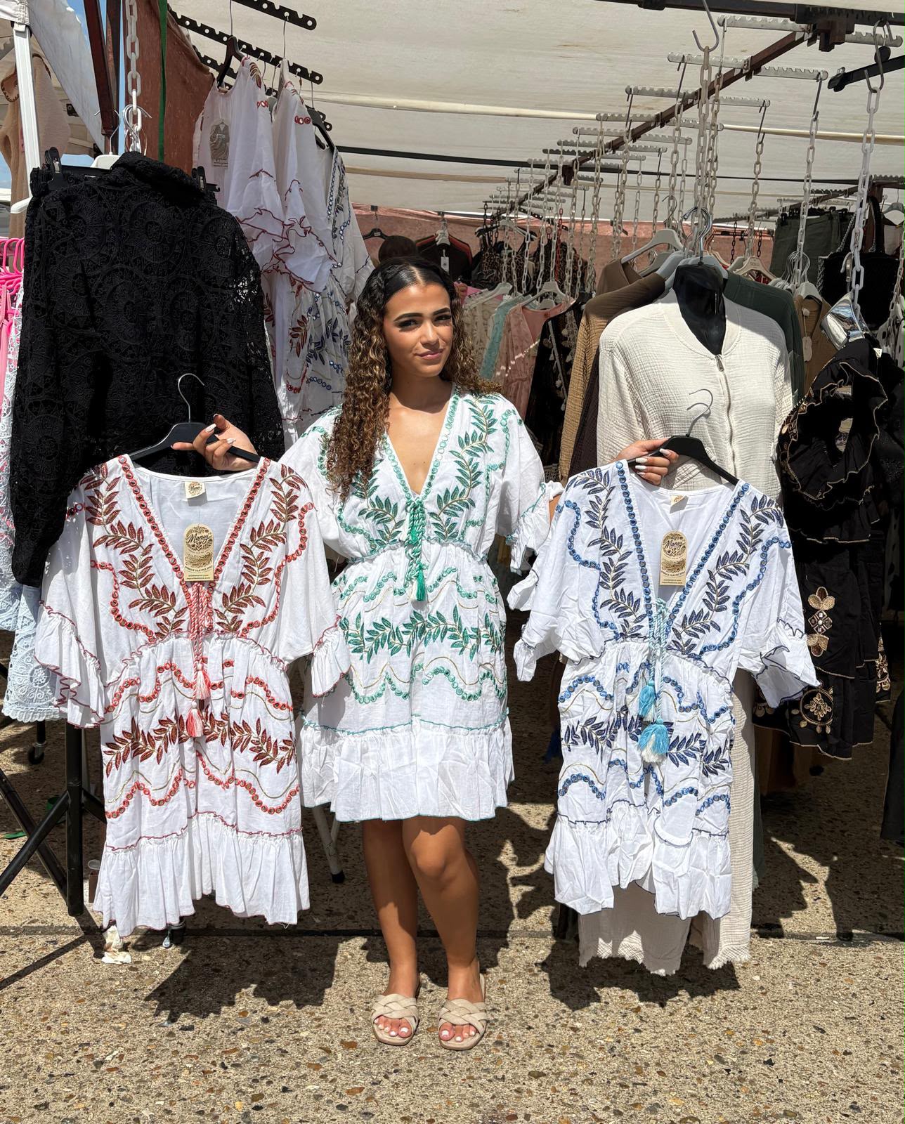 White embroidered tassel mini dress with coloured embroidery, available in Terracotta, Green and Blue from Miss Foxy Boutique.