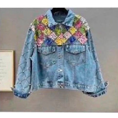 Denim jacket featuring multi-coloured crystal floral embellishments across the shoulders and pearl detailing on the sleeves. Was £35, now